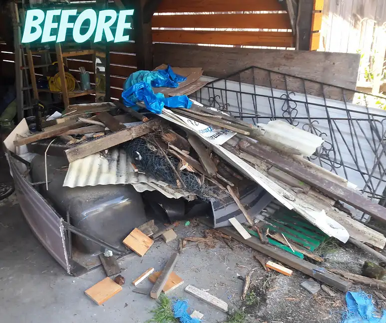 A pile of scrap metal in a garage before junk removal